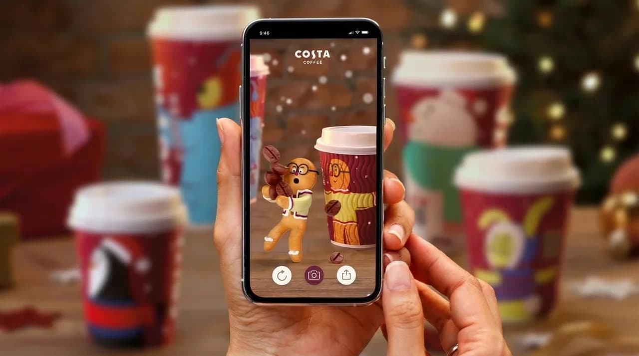 AR Christmas experience with animated characters on coffee cups.
