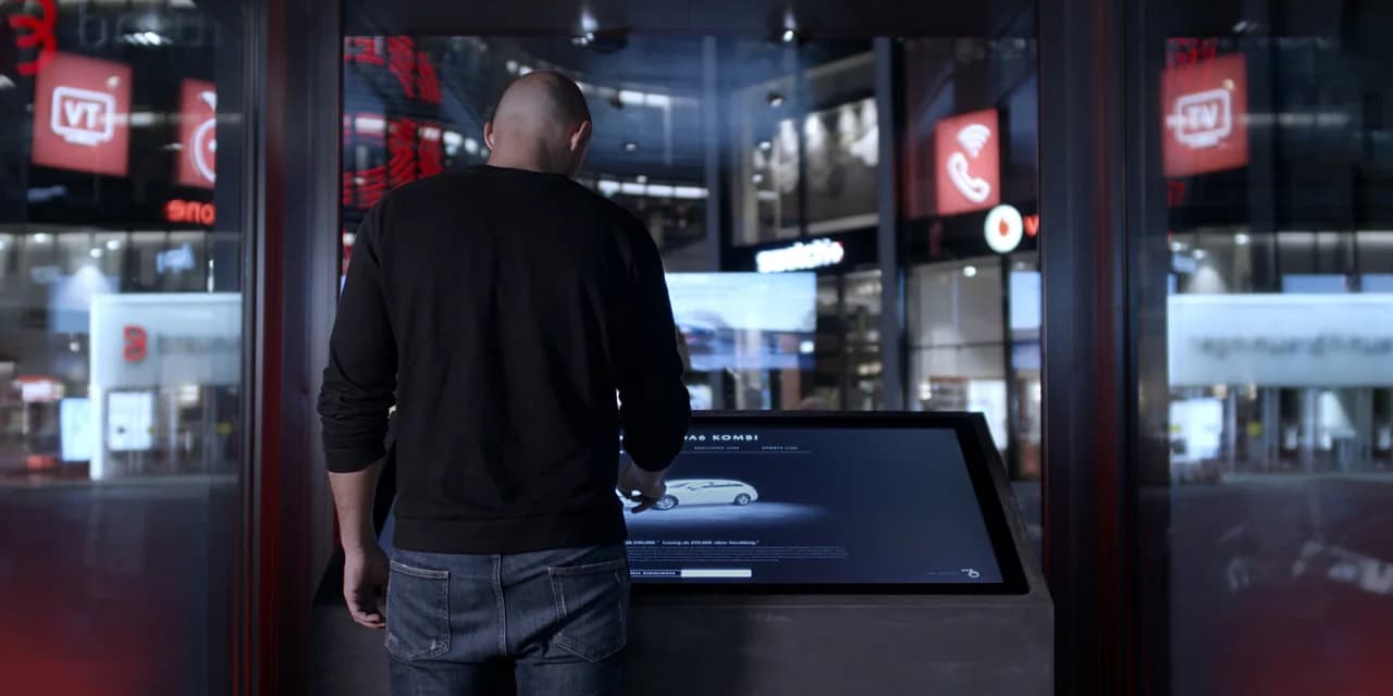 Interactive multi-touch table for the Mazda Experience Roadshow.