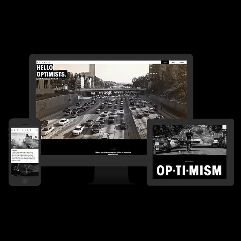 Placeholder: Desktop view with large video background and city motifs.